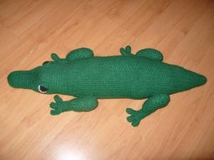 One of Emily's many creations‚Äìa knitted crocodile.