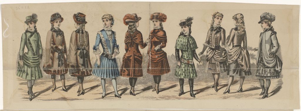 Several young girls wearing varied dresses, including green, tan, red, and blue frocks with coordinated hats. Some have matching coats.