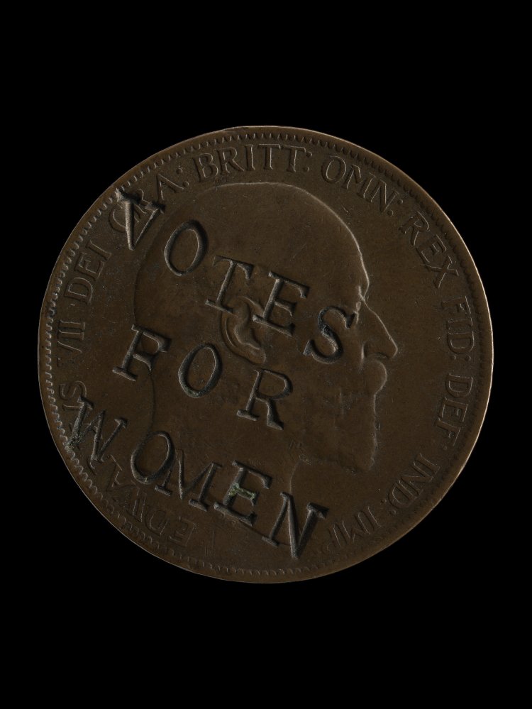 British coin defaced by suffragettes, stamped with the phrase "Votes for Women" in 1903.