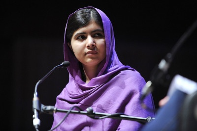 Malala Yousafzai at a podium