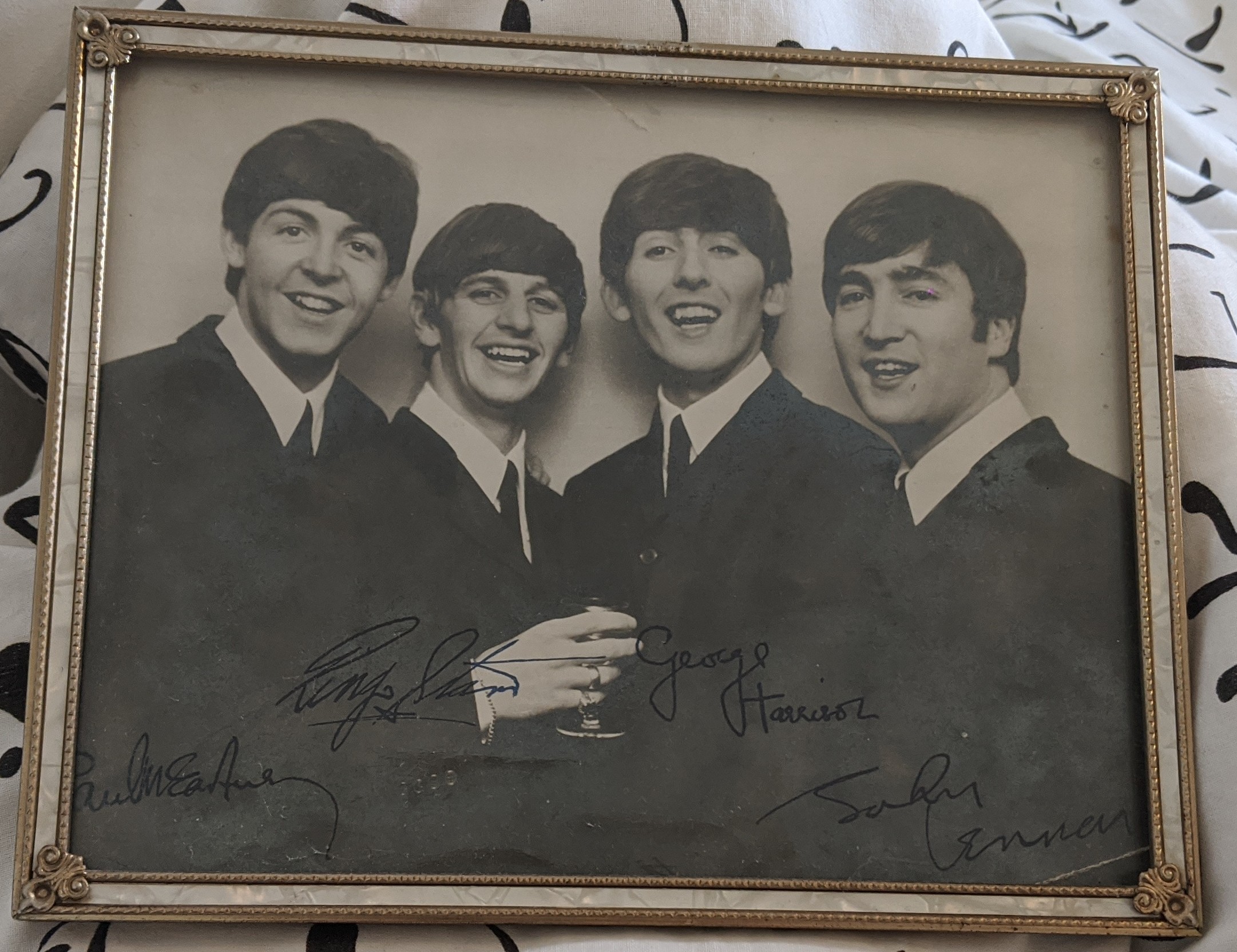 Framed photograph of the Beatles during their younger days.